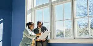 Patient and counselor reviewing an aftercare plan after rehab