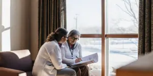 Admissions counselor discussing whether insurance may cover rehab in Ohio