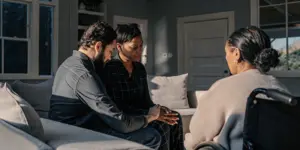 Family members having a compassionate conversation about treatment