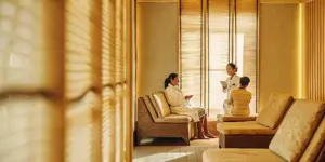 Comfortable therapy room with soft natural light representing holistic pain and addiction recovery treatment at Legacy Healing Center