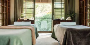 A calm, welcoming, luxury residential treatment center interior with soft natural light